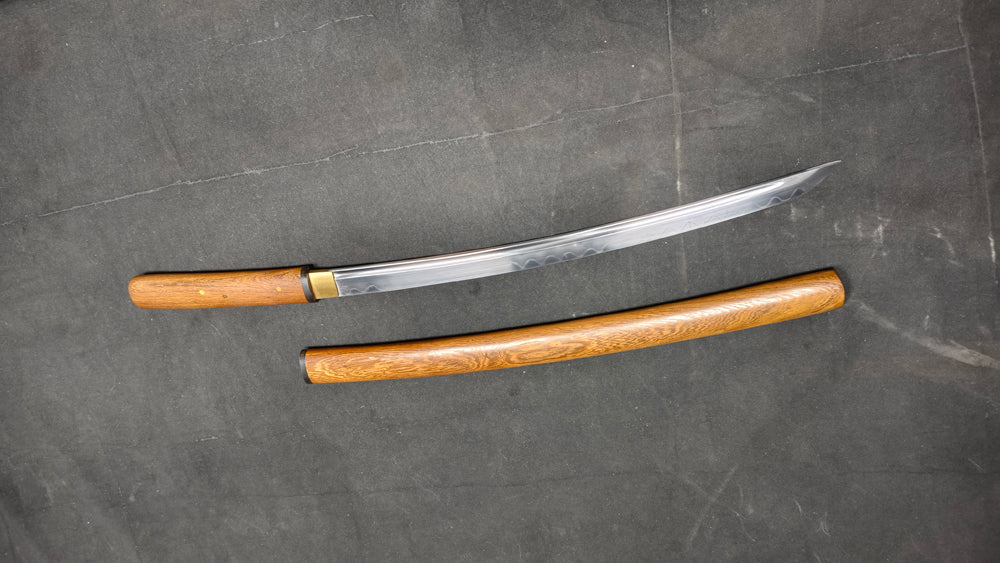 TI0 (covered with soil and burned to create the blade's ripple pattern)katana